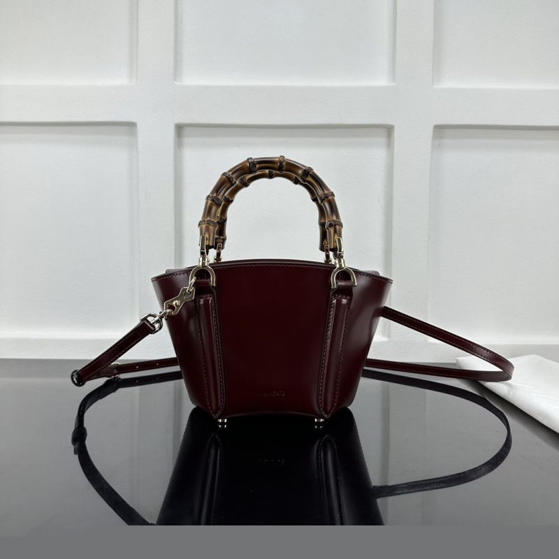 G*u*i top handle bags
